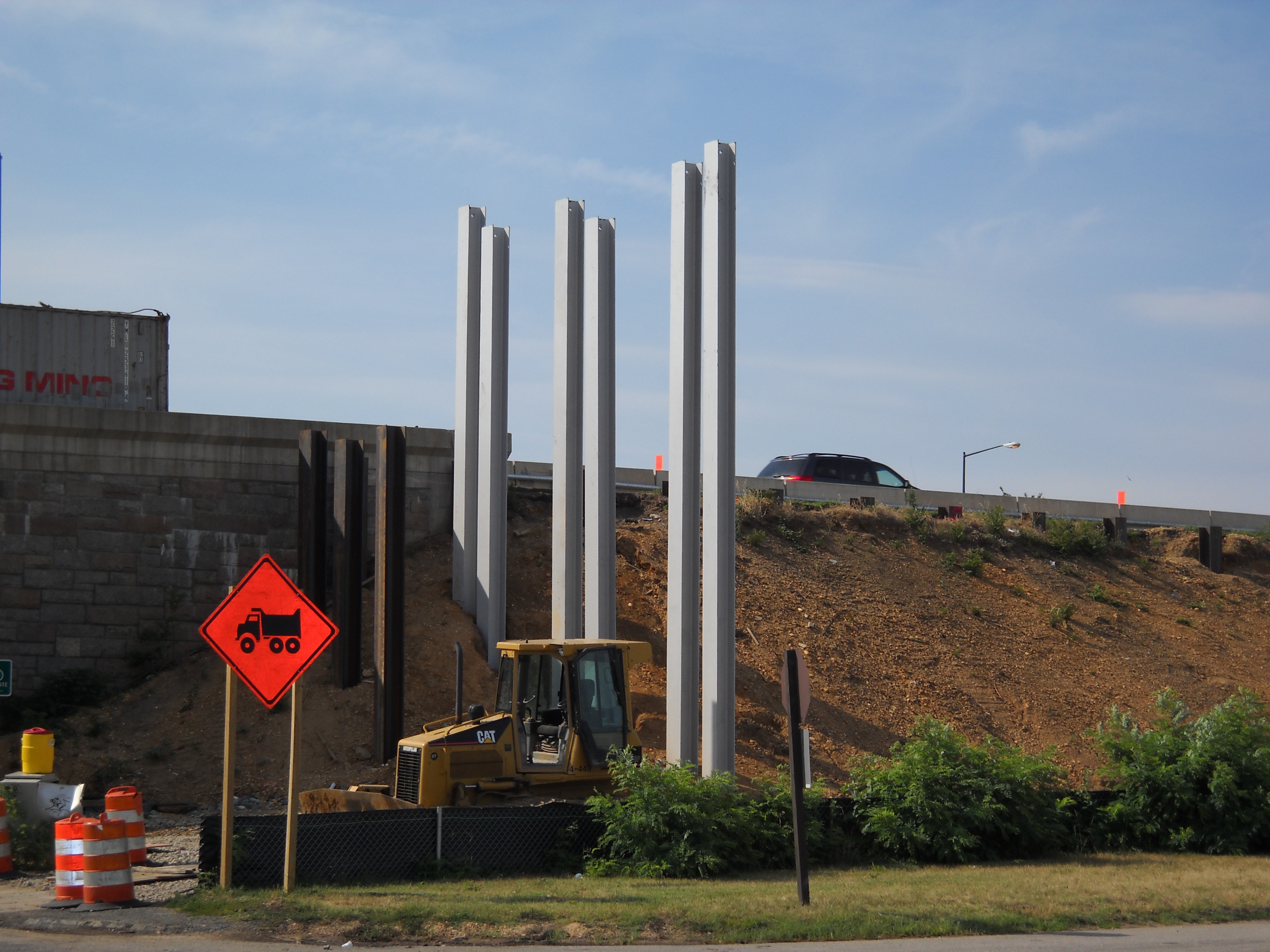 Installed piles treated with Foundation Technologies Slickcoat anti-friction coating at construction site