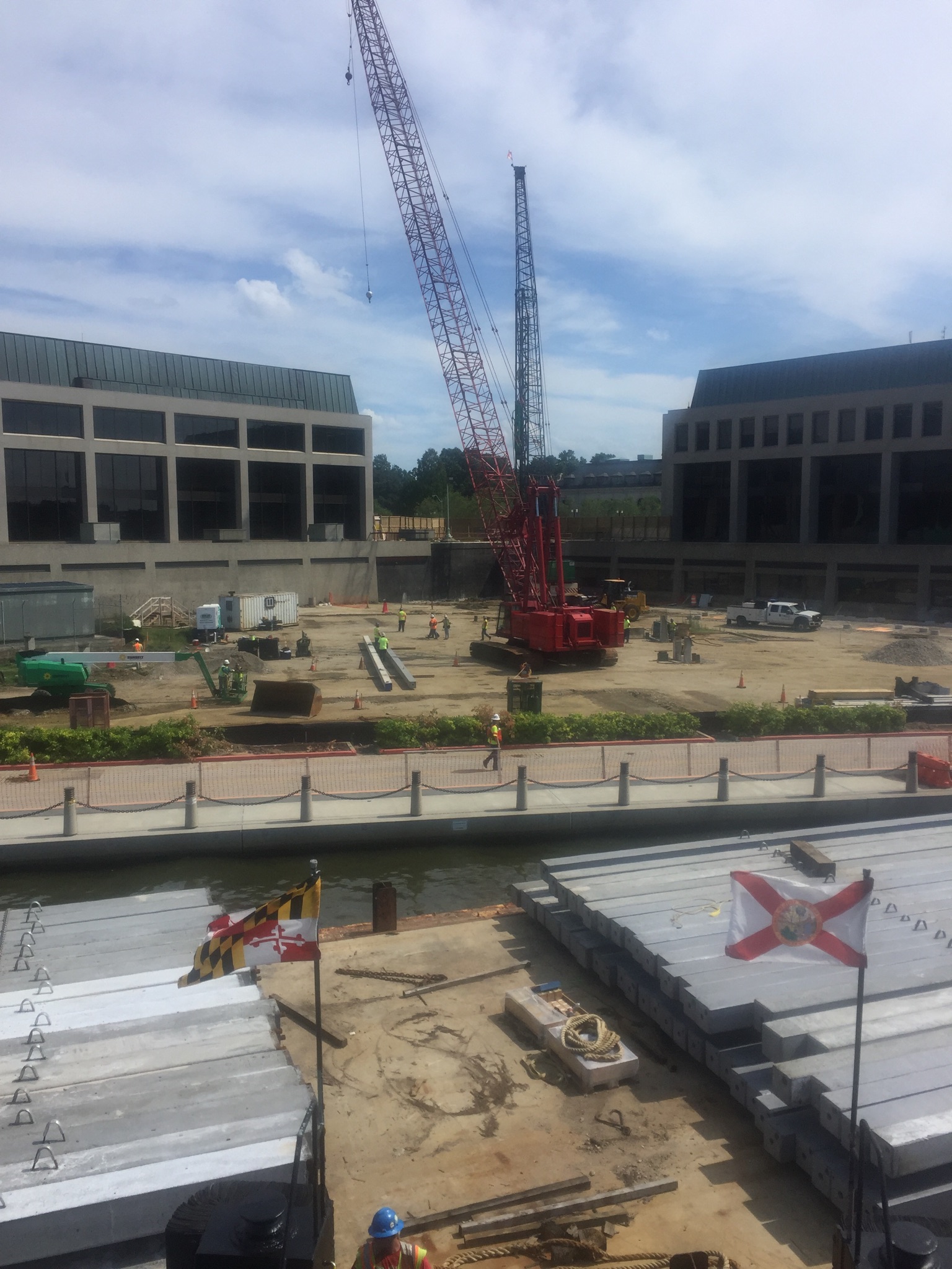 Piles treated with Foundation Technologies Slickcoat anti-friction coating shown at construction site 